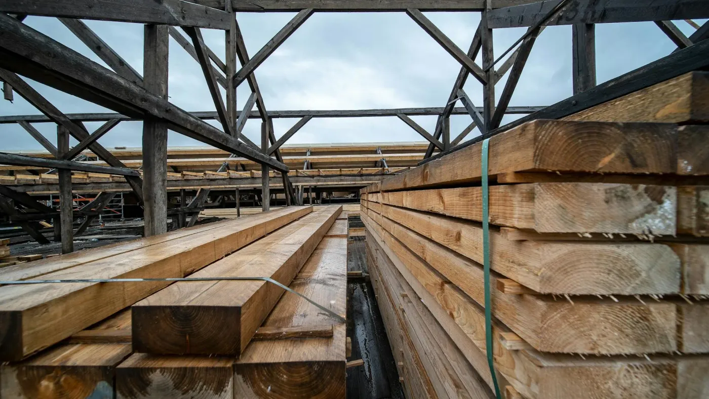 Treated timber stacks in a sawmill yard